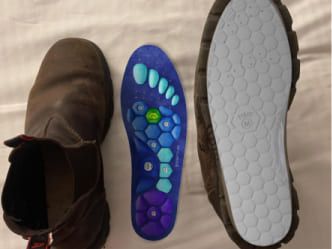 Akusoli insoles next to boot
